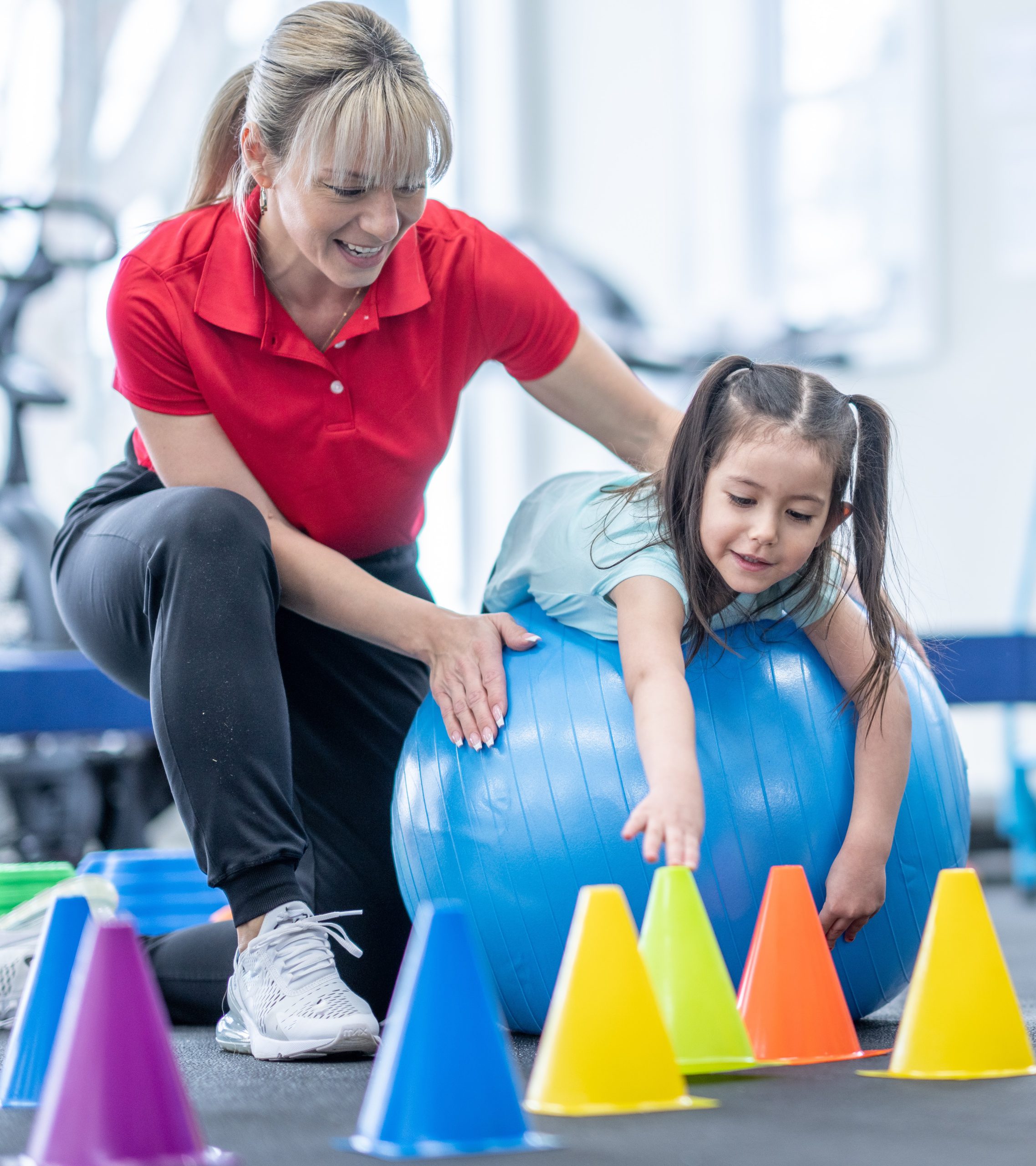 Therapist with child doing occupational therapy in best speech and language therapy clinic.